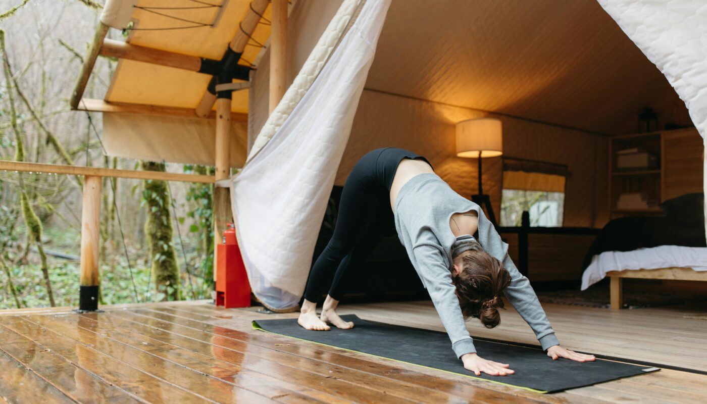 https://www.pexels.com/photo/woman-in-black-long-sleeve-shirt-and-gray-pants-doing-yoga-7662380/