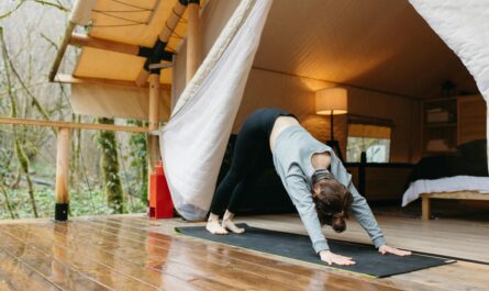 https://www.pexels.com/photo/woman-in-black-long-sleeve-shirt-and-gray-pants-doing-yoga-7662380/